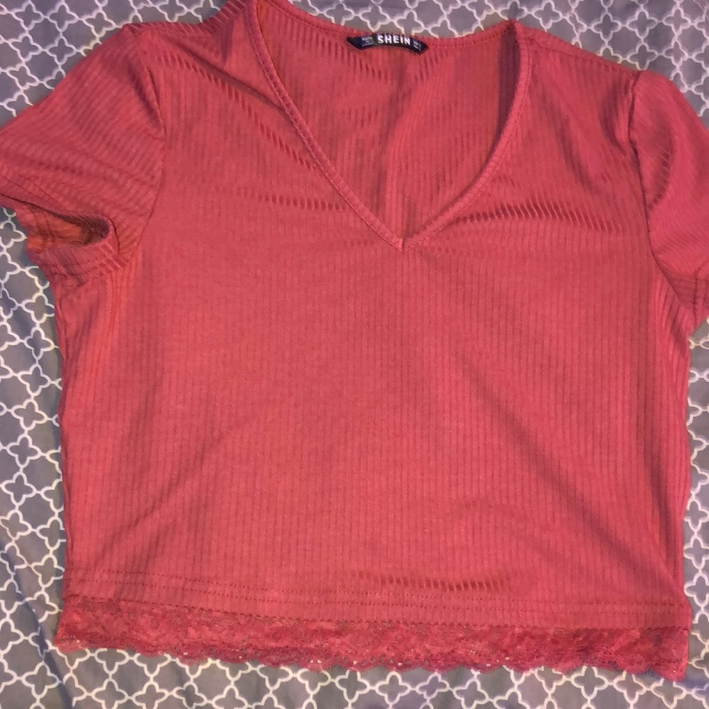 pink cropped top